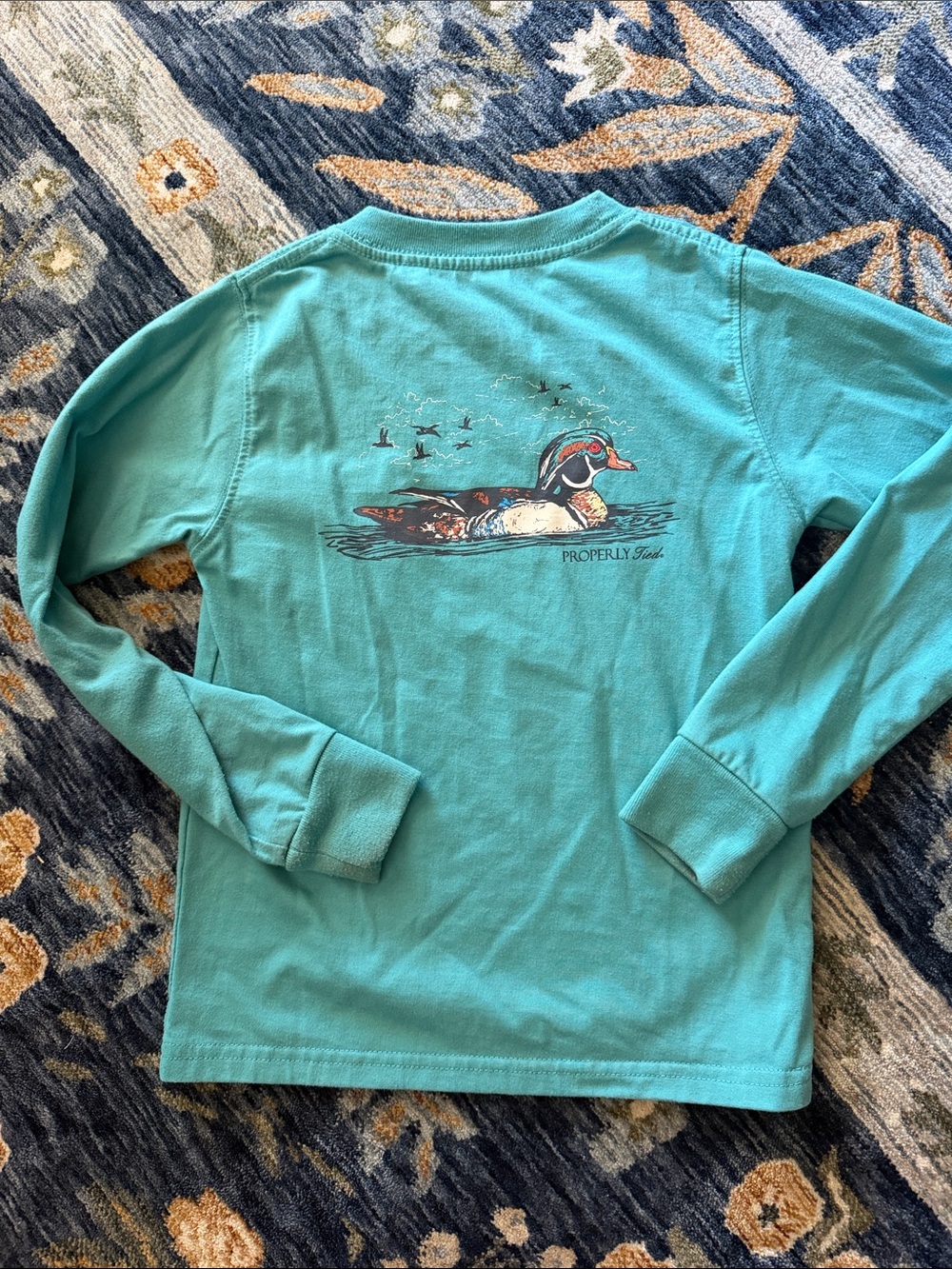 Properly tied Teal Kids Long-Sleeve Shirt with Duck Graphic